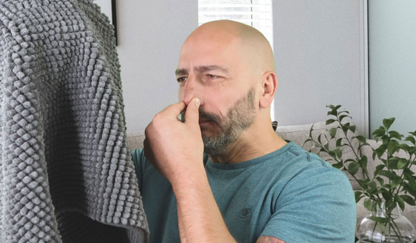 Man Pinching Nose